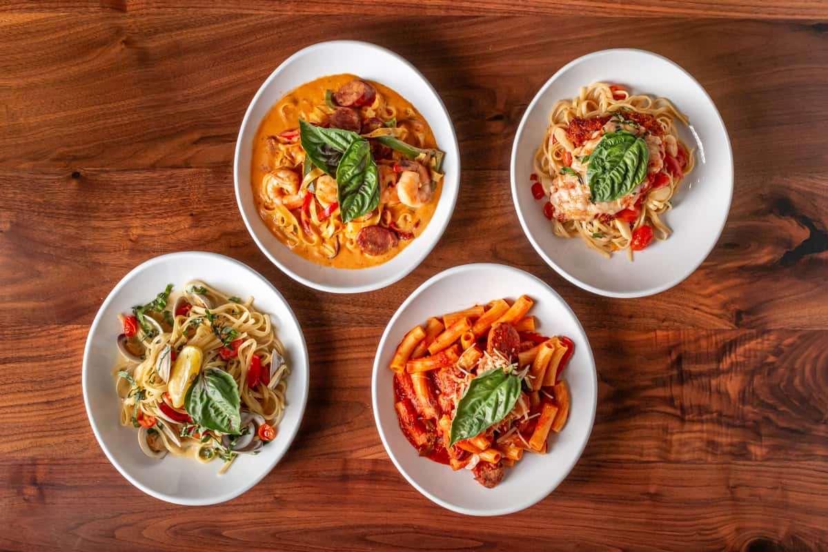 A tempting selection of pasta dishes from 17th Street Grill, capturing the essence of American food with a gourmet twist.