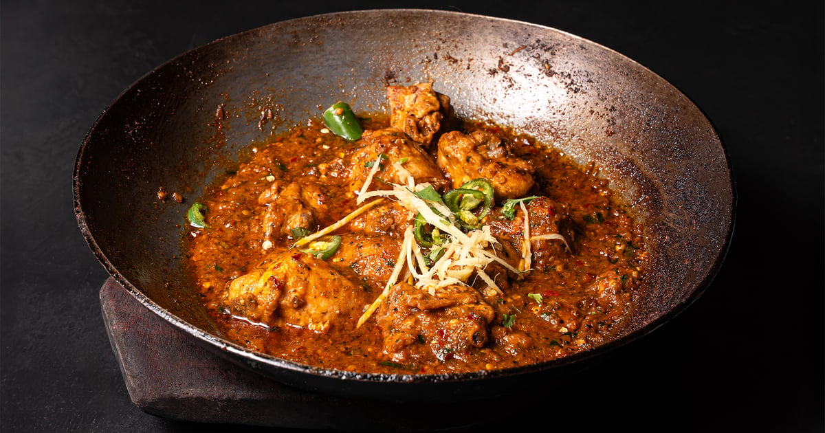 Chicken Shinwari Karahi in a traditional black karahi