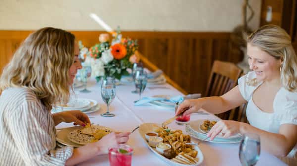 Women dining together at Taverna