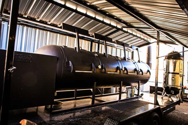 Use our 1,000 gallon Moberg smoker, or one of several Webers on site