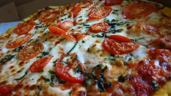 Whole Margherita pizza