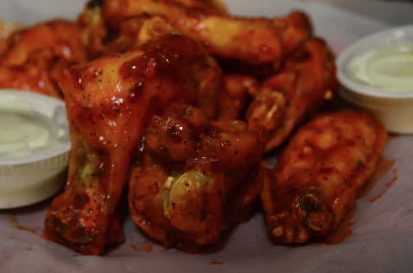 Chicken wings served with a side of ranch or bleu cheese.