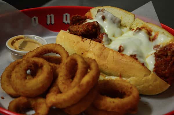 Parmesan sub with a side of onion rings.