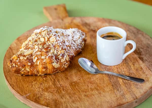 Freshly baked croissant with coffee