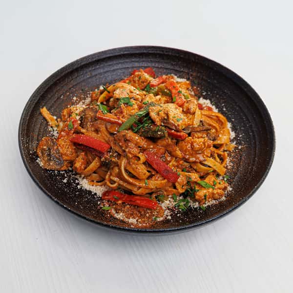 CAJUN FETTUCCINE WITH SAUSAGE CHICKEN & SHRIMP