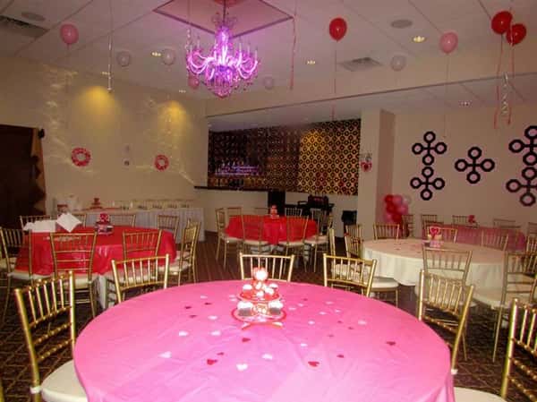 several round tables with heart-shaped decorations
