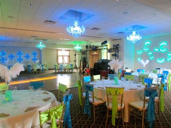 a few round tables decorated for a birthday party
