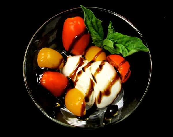 dessert drizzled with chocolate in round bowl