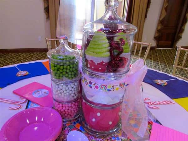 center of table with jars full of candy