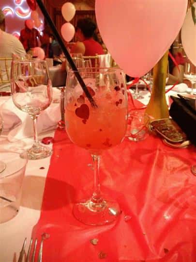 drink in glass with a straw