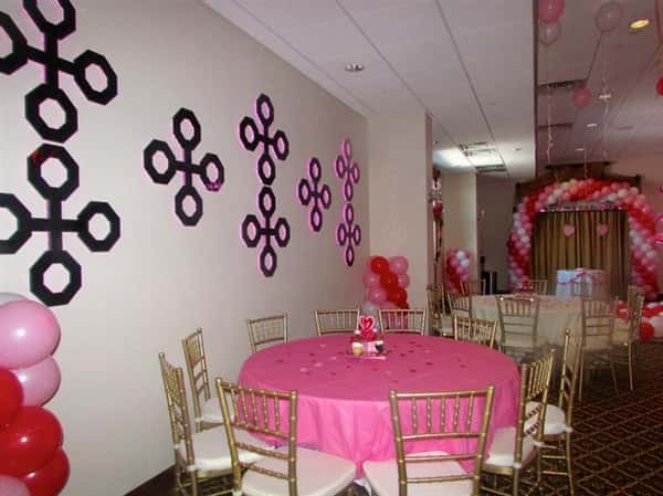 several round tables with heart-shaped decorations