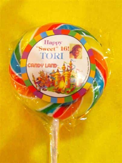 large sucker that reads happy "sweet" 16! tori candy land