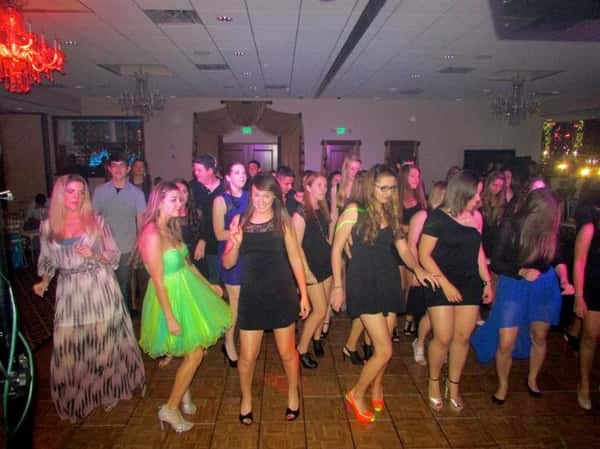 group of people at birthday party dancing