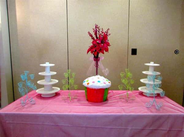 table with large decorated cupcake