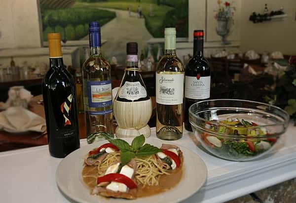 selection of wine next to an entree