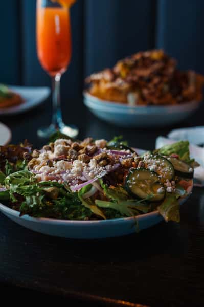 Fresh salad and signature cocktails at Oak & Pie in Wichita