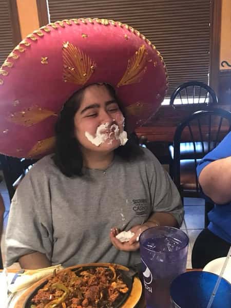 woman with whippee cream on her face