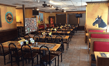 dining area with tables and chairs