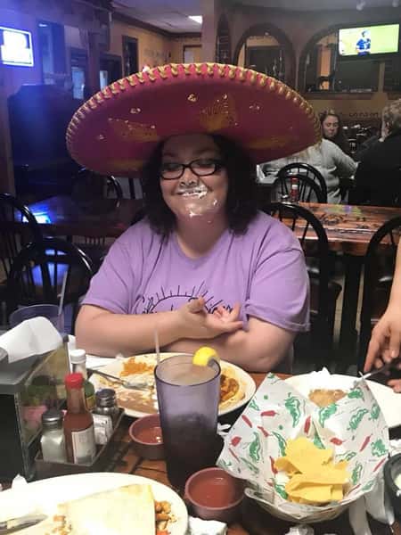 woman with whippee cream on her face