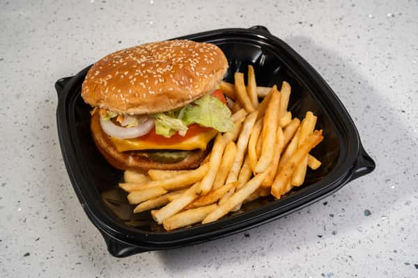 Cheeseburger served with french fries in a black takeout tray.