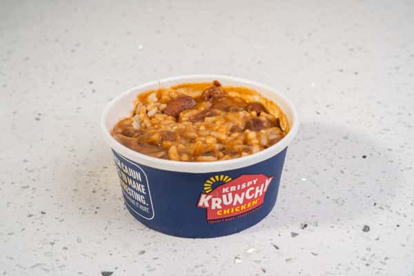 Cup of red beans and rice served in a branded container.