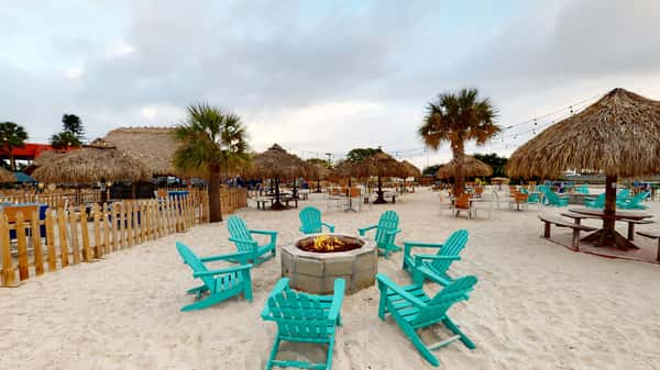 chairs encircling fire pit