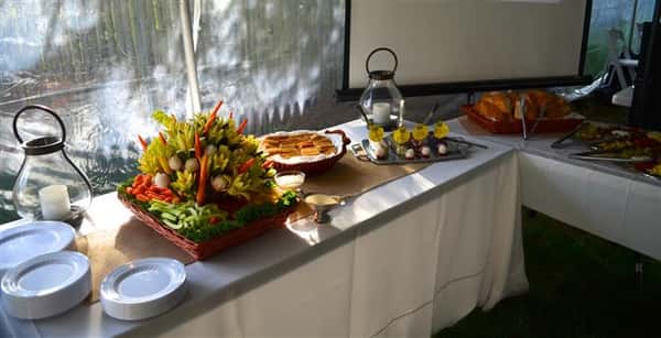 Catering table with an arrangement of different foods and horderves