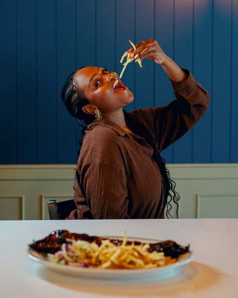 girl eating at table