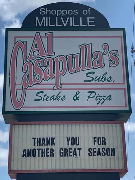 Al casapulla's subs, steaks, and pizza sign