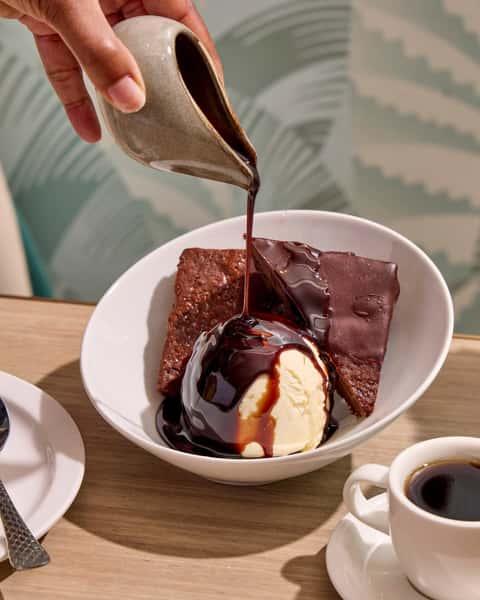 It's #NationalDessertDay, so you have the perfect excuse for a sweet treat at Dawn! Grab a table on OpenTable, or come by the bar and pair your dessert with a sweet cocktail. #DawnAMEatery #DawnChi #DawnChicago