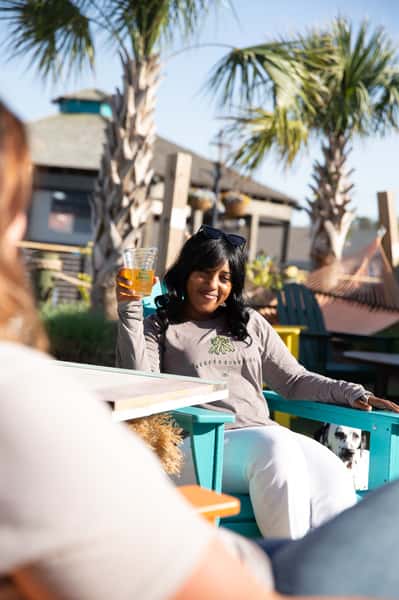 Guests toasting in outdoor patio