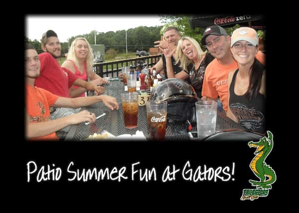 "Patio Summer Fun at Gators" party of guests at table