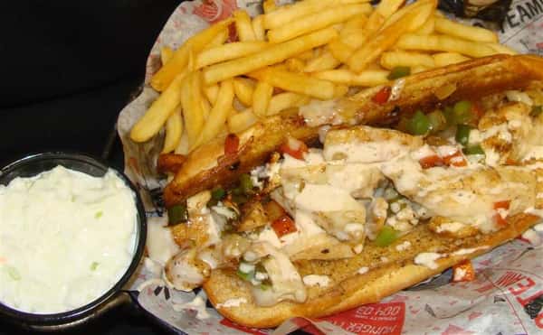 Open sandwich with fries and sauce
