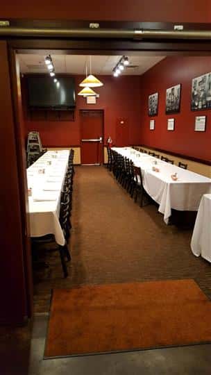 Tables and chairs with red walls