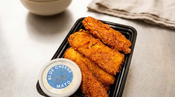 Crispy fried chicken tenders served with @Lunch blue cheese mayo dipping sauce