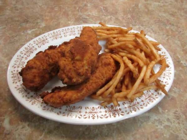 Chicken tenders with a side of french fries