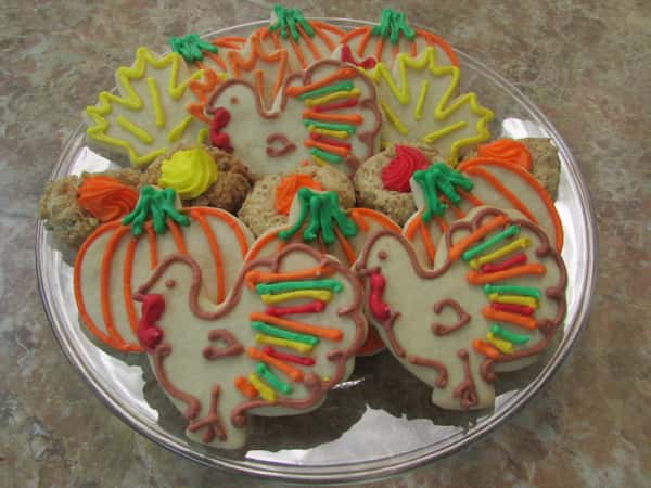 Tray of pumpkin, turkey, and leaf cookies
