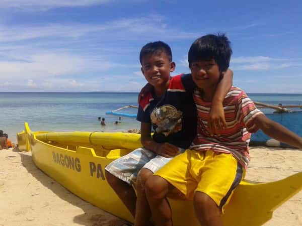 Children in a Yellow Boat