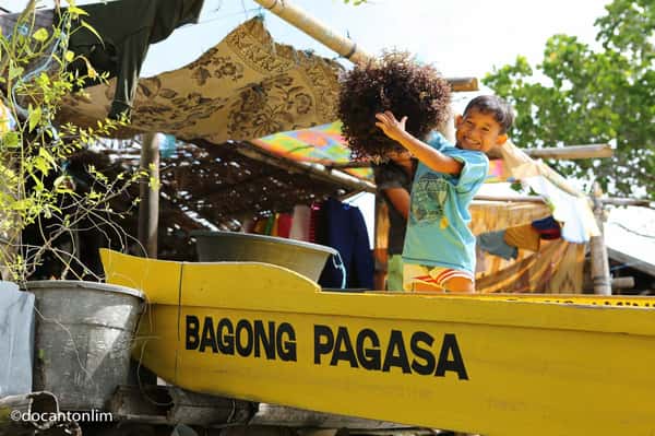 Children in a Yellow Boat