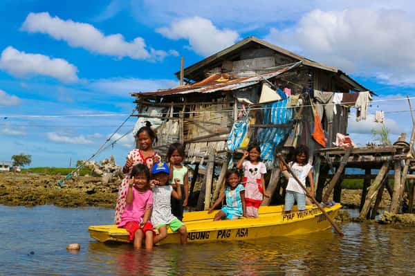 Children in a Yellow Boat