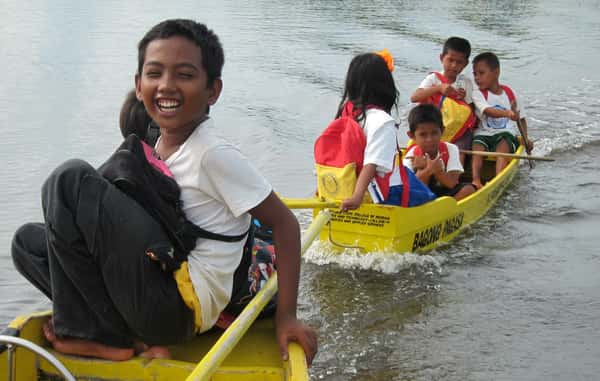 Children in a Yellow Boat