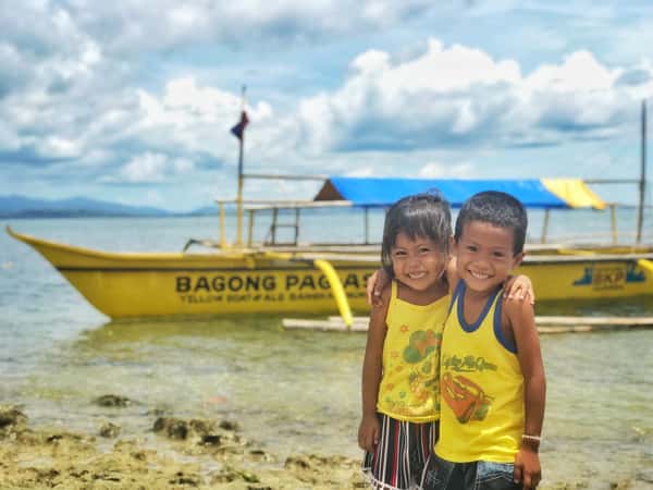 Children in a Yellow Boat