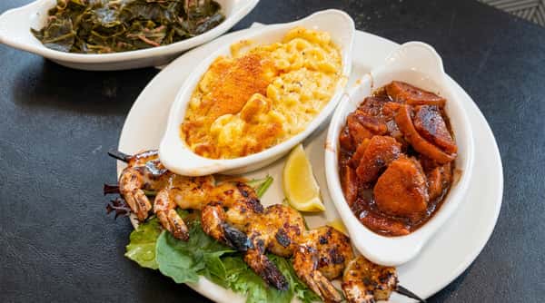 Grilled shrimp platter with mac and cheese and Southern sides at DSquared in St. Louis
