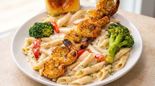 Grilled shrimp Alfredo pasta with broccoli and vegetables at DSquared in St. Louis