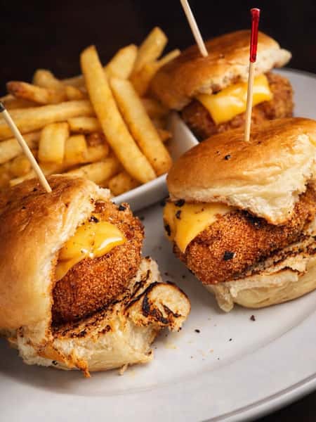 Crispy fried fish sandwiches with seasoned fries at DSquared in St. Louis
