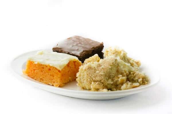 two slices of cake and cobbler