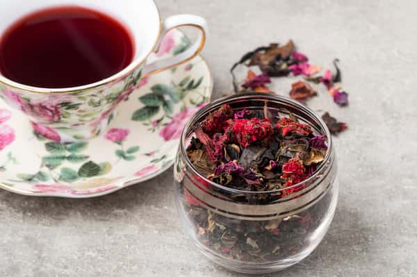Red loose tea in teacup