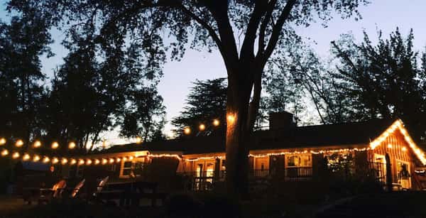 A night shot of the Lodge and Wine Bar at the Queen's Inn.