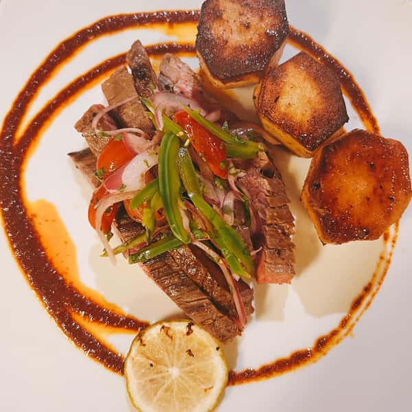 A recent Supper Club dinner featuring Bavette Steak, Tomato Escabeche, Fondant potatoes & Mojo Rojo Sauce