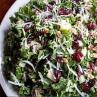 salad with cheese, nuts and raisins mixed in